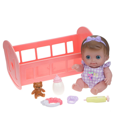 All Vinyl Doll in Rocking Cradle with Accessories